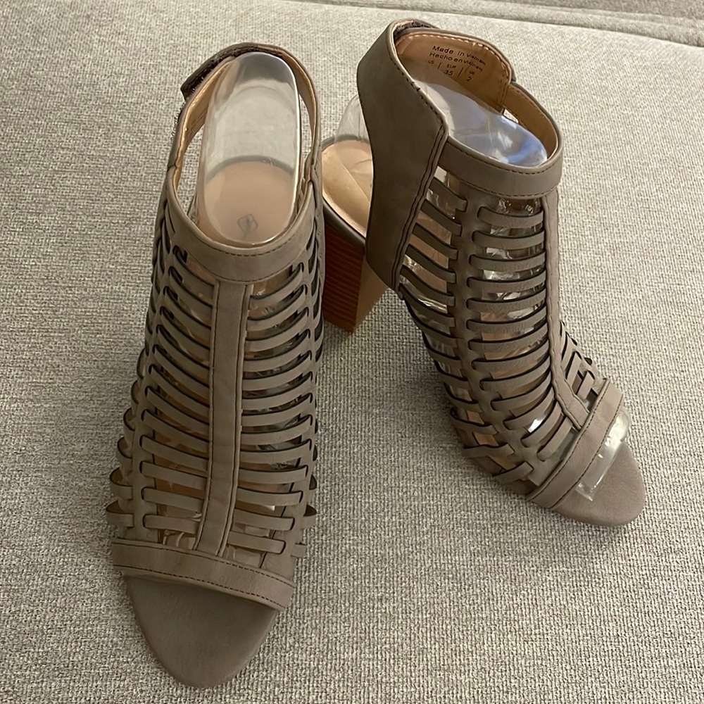 Open toe strap heel. Women’s size 5